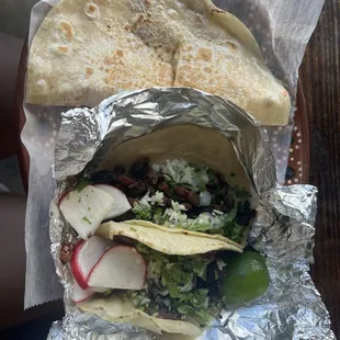 Steak tacos and chicken quesadilla