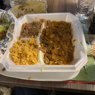 Picadillo with rice and beans and house made tortillas
