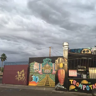 a taqueria on the corner of a street