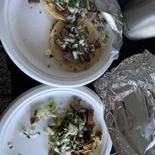 Three tacos, no rice and beans that are suppose to come in the order.