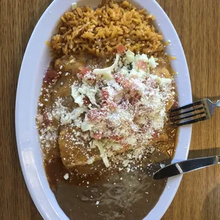Chipotle enchiladas. Rice and beans much better than fast food. The enchiladas were just right with seasoning and size. Yum!