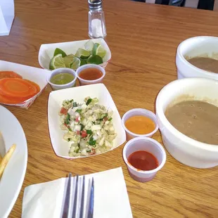 Goodies from the salsa bar, and our (bland) beans.