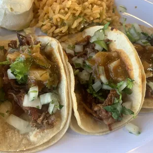 Shredded beef and pork carnitas tacos