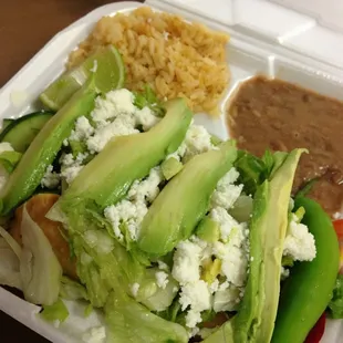 Flautas de pollo....piled with so much extra goodness, you can't even see them!