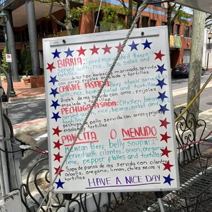 a sign on the sidewalk