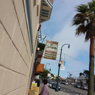 The sign in front of the store.