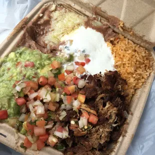 a meal in a styrofoam container