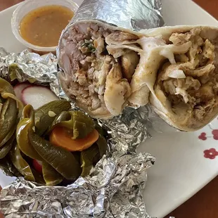 Pescado fish burrito, a whole fistful of pickles