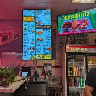 a man standing in front of the counter