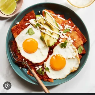 Chilaquiles with egg, eggs and avocado