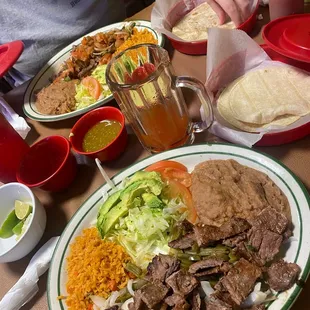 Carne asada plate and fajita a la mexicana plate