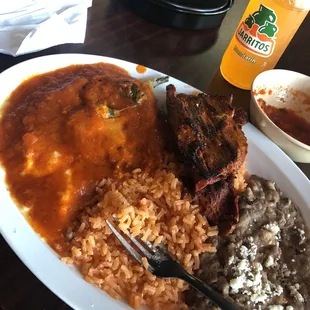 Chile relleno, rice, refried beans and possibly skirt steak.