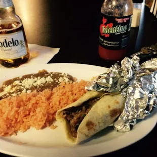 Barbacoa burrito and a Modelo. The tables have black label Valentina's, so you know they know what they're doing