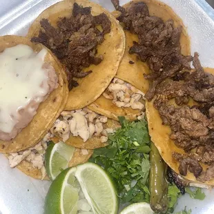 Bean and cheese, carne asada and chicken tacos