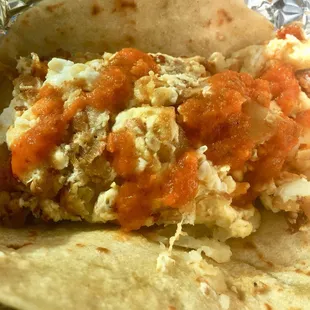 Doesn't look like much but this bacon egg and papa taco is what dreams are made of!