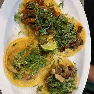 Carnitas, birria, chicharon, and fajita tacos