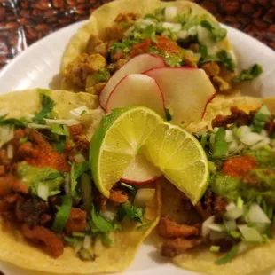 three tacos on a plate