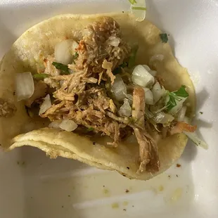 This is a Chile verde taco , tasted like tuna . Ordered 2 but only had 1
