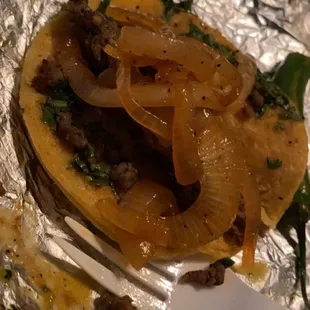 $1 tacos with grilled onions