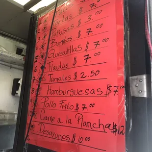 a menu on a food truck