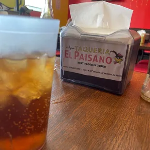 a cold beverage in a plastic cup