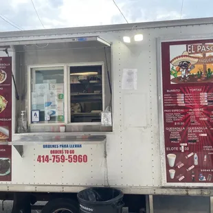 a food truck with menus