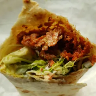 The pork burrito mostly lettuce and no beans, tomatoes or cheese.