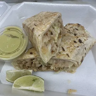 Chicken  burrito  and creamy green salsa