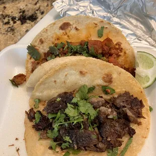 Pastor and Barbacoa lunch tacos on corn tortillas