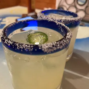 two margaritas on a table