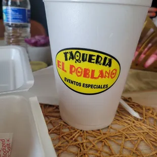a plastic cup with a sticker on it