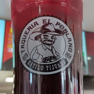 a drink in a plastic cup