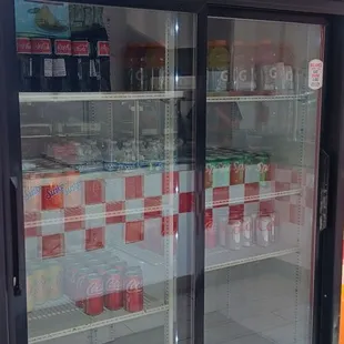 a refrigerated coke cooler