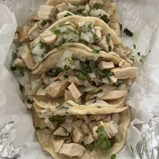 Chicken tacos. The cook definitely skipped the seasoning part of the recipe.