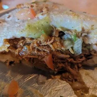 Lunch Burrito Full of Guisidos, good value, but bland $10.50 w Fountain Drink 1-2024