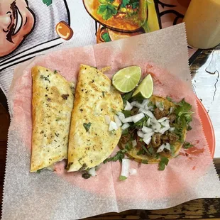 Pastor and Barbacoa quesadilla, tripa taco