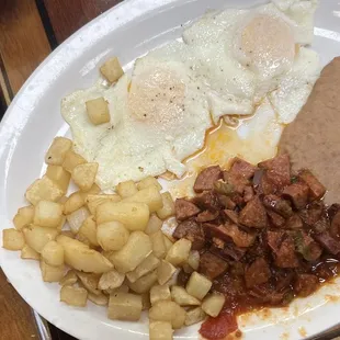 Huevos rancheros with country sausage! So good. Nice big plate!