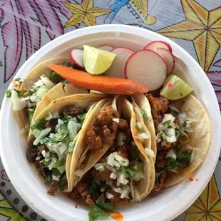 Tacos. Two beef, two spicy pork - very tasty and only $5 total. Yums.