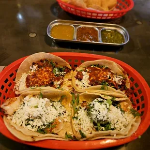 Chorizo tacos with queso fresca and shrimp tacos with queso fresca
