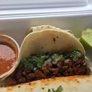 Tacos de pastor, lengua, and asada