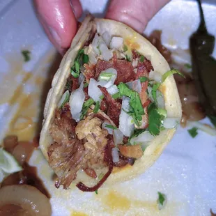 A little too crispy inside this carnitas taco.