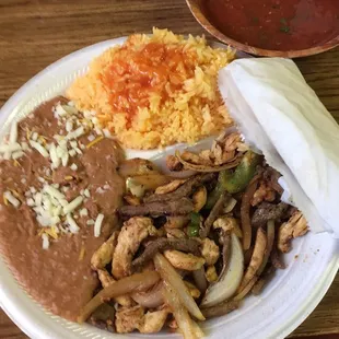 Chicken and beef fajitas. Very good!