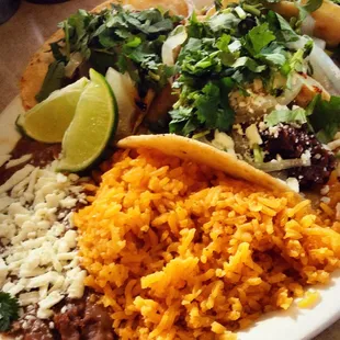 Tacos: barbocoa and asada      Sides: frijoles y arroz