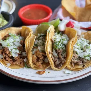 Left to right 1 Al Pastor 1 Pollo &amp; 2 Carne asada tacos