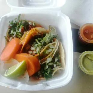 I ordered 3 tacos @ $1.50 each. They were great. I enjoyed both the red and green sauce. They were appropriately spicy (they had spice).