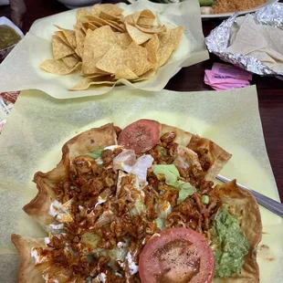 Skirt steak and pollo taco salad
