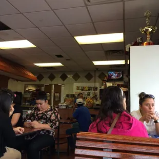 a group of people sitting at tables