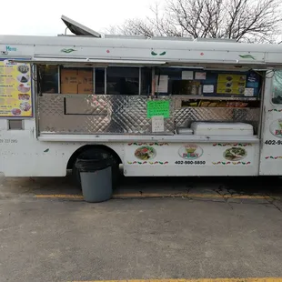 a taqueria truck parked in a parking lot