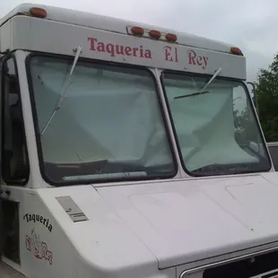 a taqueria truck parked in a parking lot