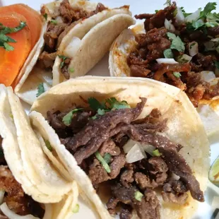 Pollo, pastor, asada &amp; carnitas tacos..range from 5/5 to good. All quality.